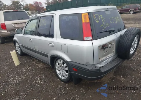 1999 Honda Cr-V Ex z USA, uszkodzony, nr VIN JHLRD1863XC074387